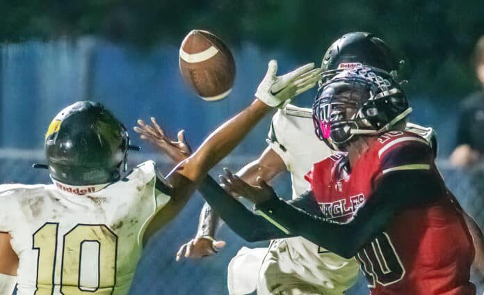 Springtead High, 10, CJ Cresser concentrates to catch a touchdown pass Friday night against Mitchell High. Photo by JOE DiCRISTOFALO