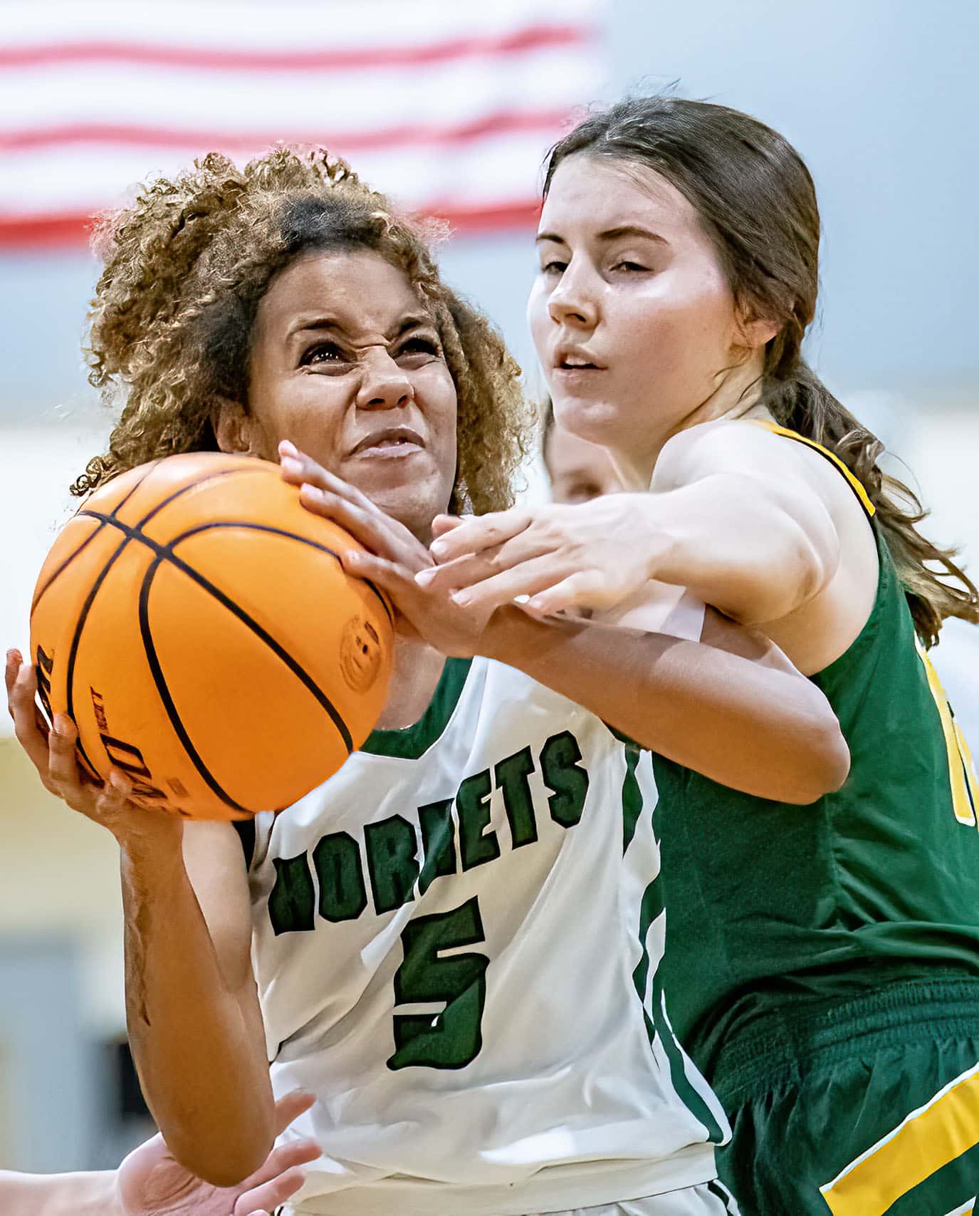 Weeki Wachee High, 5, Arianna Williams gets fouled on the way to the basket in the game against Cypress Creek Wednesday at Weekie Wachee High. Photo by JOE DiCRISTOFALO