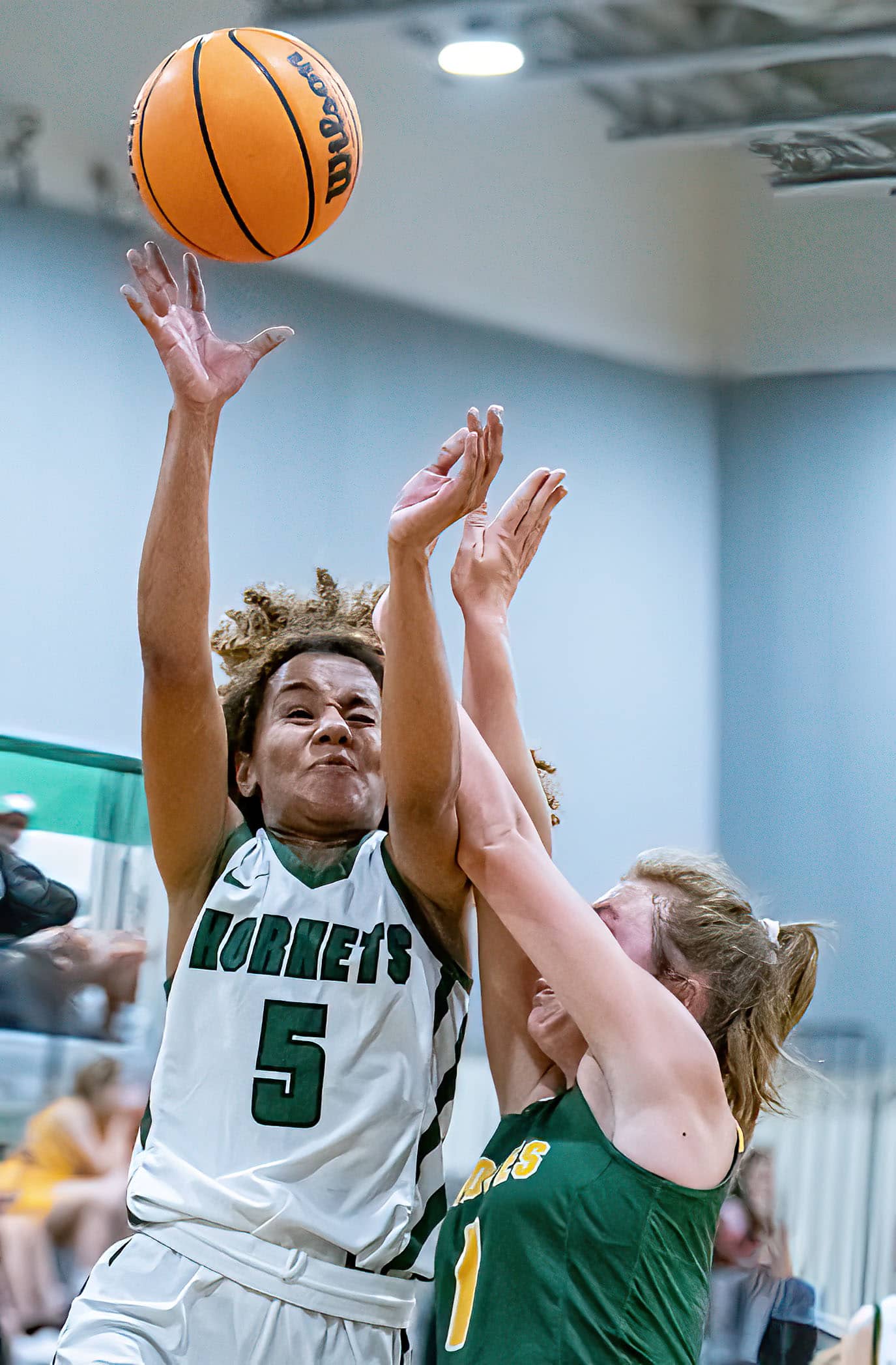 Weeki Wachee High, 5, Arianna Williams gets fouled while putting up a shot in the game against Cypress Creek Wednesday at Weekie Wachee High. Photo by JOE DiCRISTOFALO