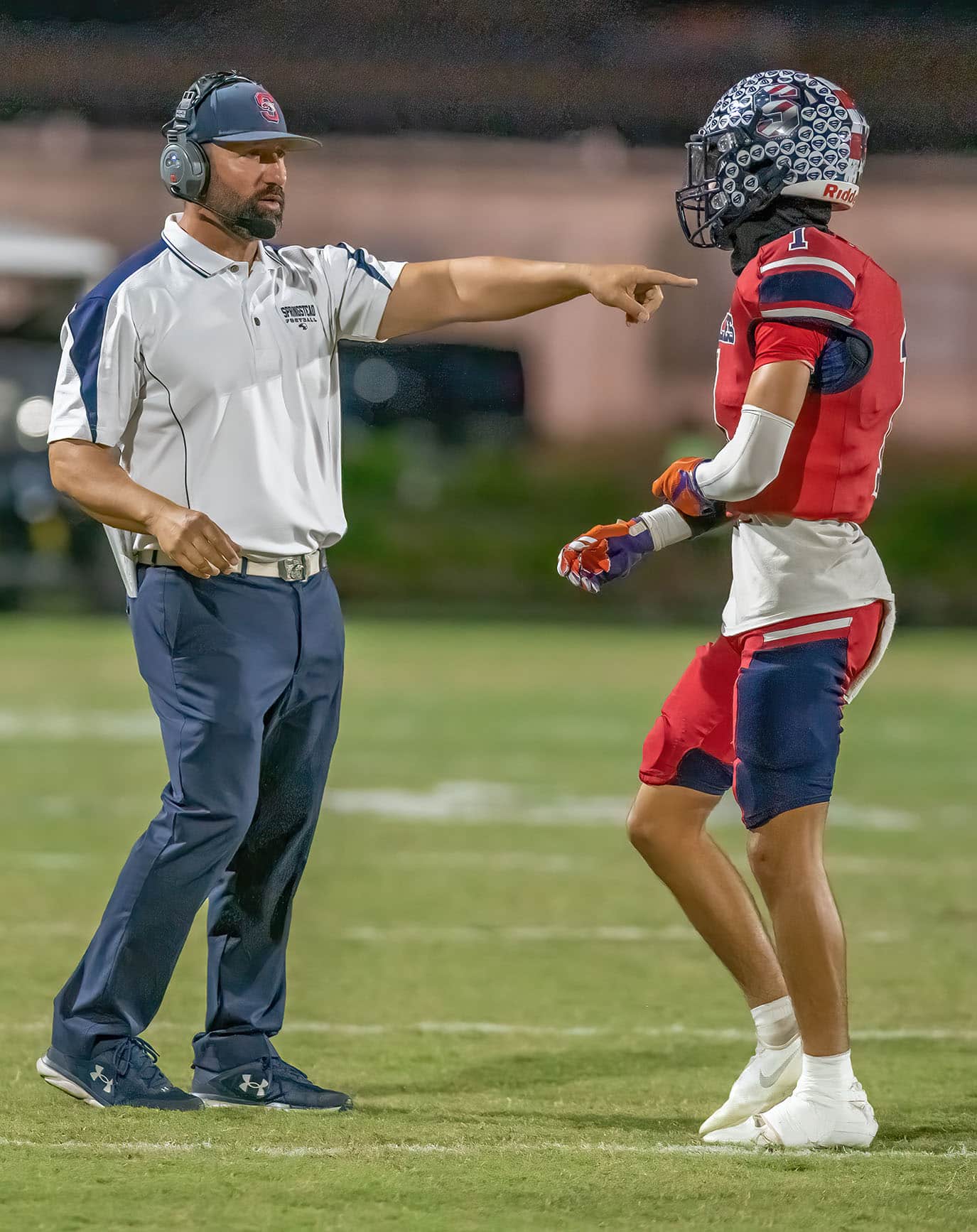 Springstead Head Coach Mike Garafalo details a play to ,1, Luca Garguilo during the first half of the win over Lecanto. Photo by JOE DiCRISTOFALO