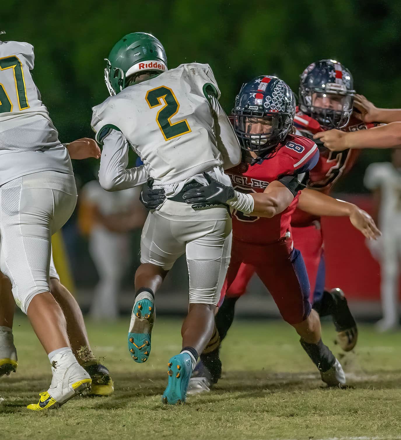 :Springstead High, Jadon James, 8, wraps up a Lecanto runner Friday night in Spring Hill.Photo by JOSEPH DiCRISTOFALO