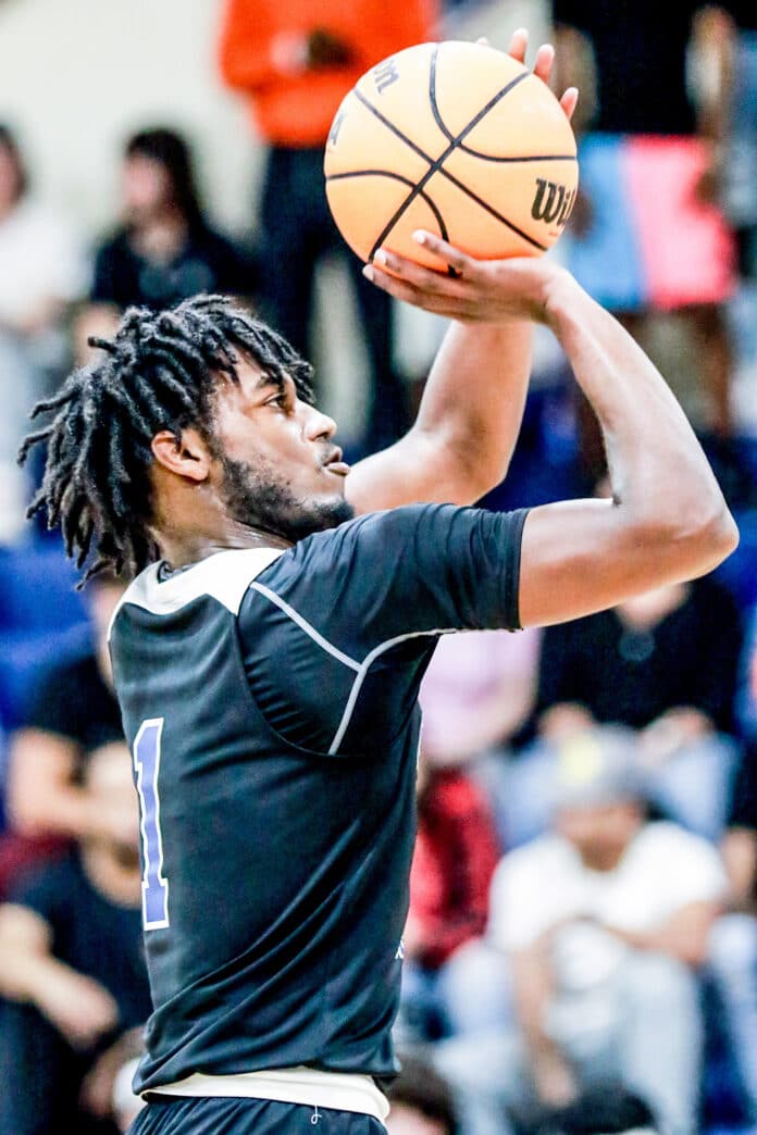 Thursday night 12/1 Central #1 Senior Jaleel Thrower takes a foul shot against Springstead. Photo by Cheryl Clanton.