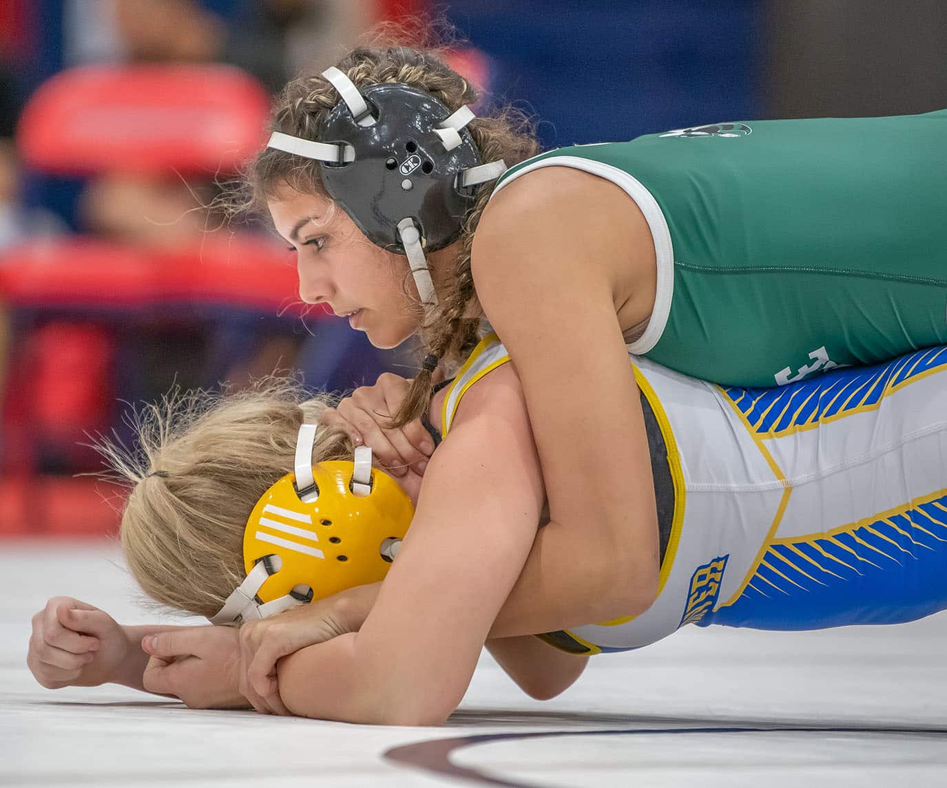 Jadyn Aponte from Weeki Wachee took control over Crystal River High Charlotte Cooper at 135 pounds in the Susan Duval Girls Bash at Springstead High. Photo by JOE DiCRISTOFALO