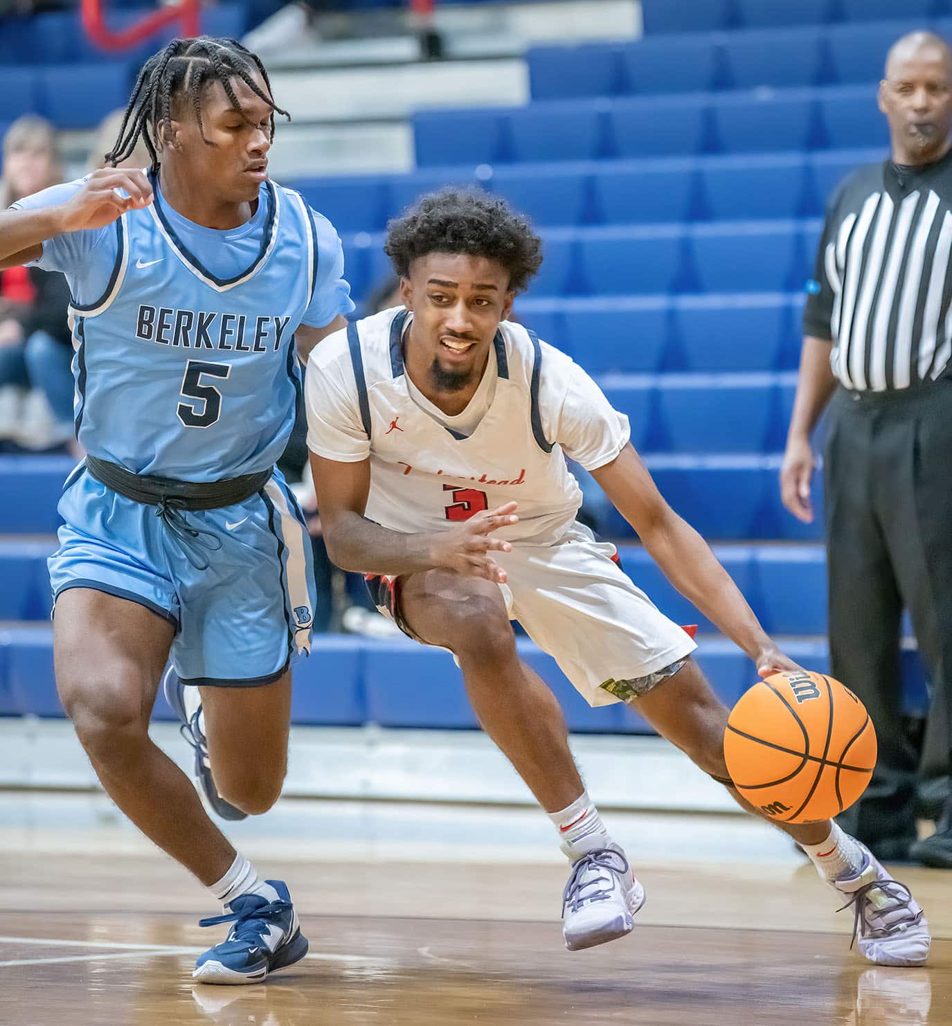 Springstead High, 3, Divine Torain, tries to drive past the defense by Berkely Prep ,5, Damien Henderson Wednesday in the 8th Annual Greg O’Connell Shootout at Springstead High. Photo by JOE DiCRISTOFALO