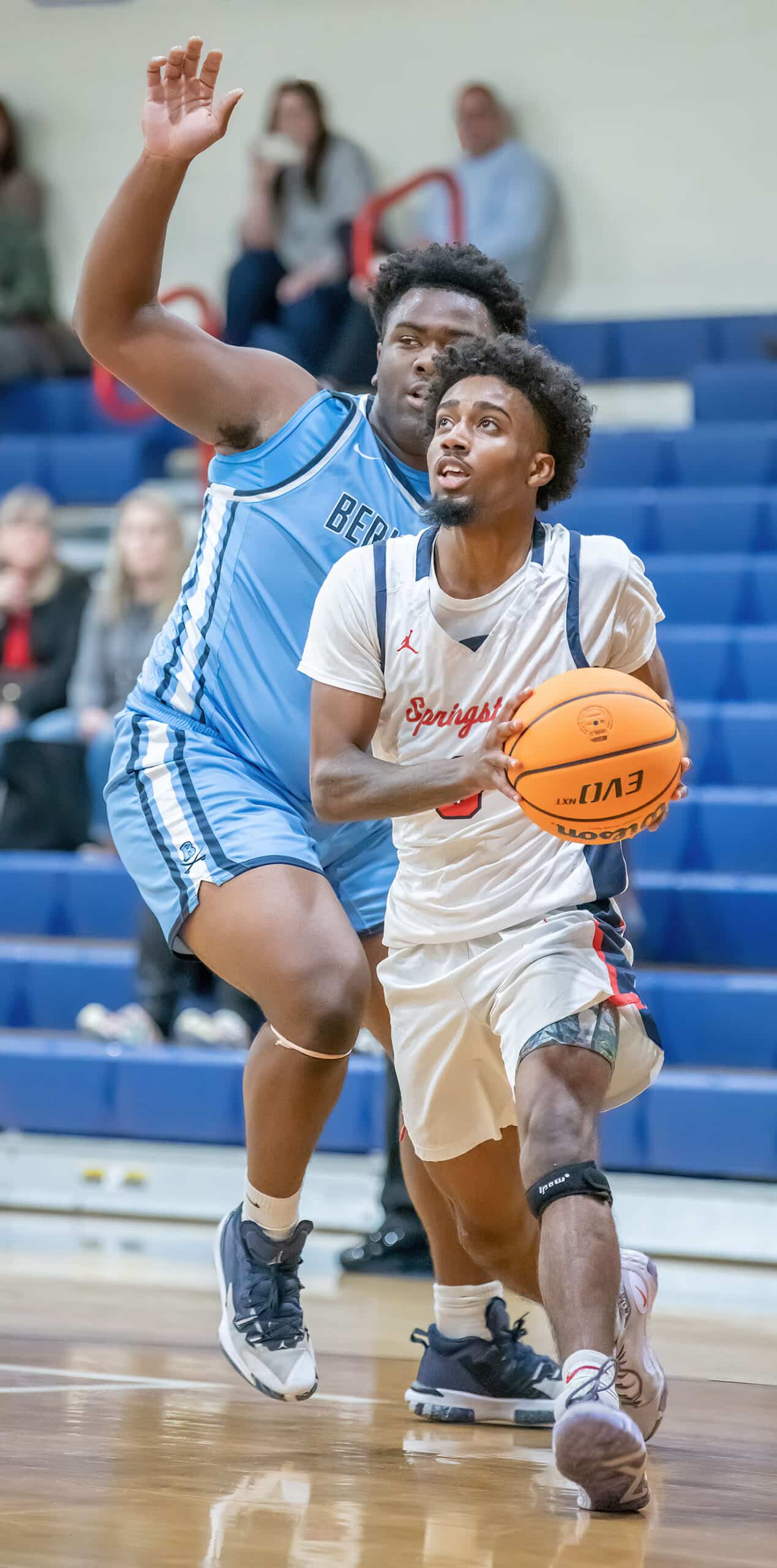 Springstead High, 3, Divine Torain, eyes the basket while guarded by by Berkely Prep ,11, Nikhil Jefferson Wednesday in the 8th Annual Greg O’Connell Shootout at Springstead High. Photo by JOE DiCRISTOFALO