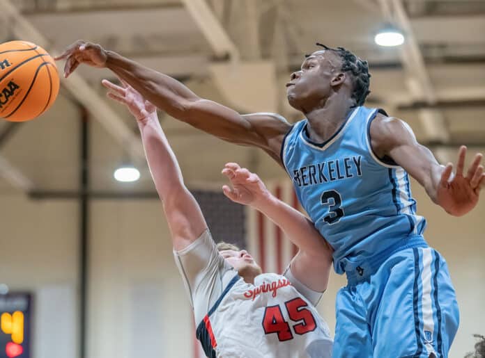 Springstead High, 45, Mikey Lanziero has a shot attempt blocked by Berkely Prep ,3, George Kimble Wednesday in the 8th Annual Greg O’Connell Shootout at Springstead High. Photo by JOE DiCRISTOFALO