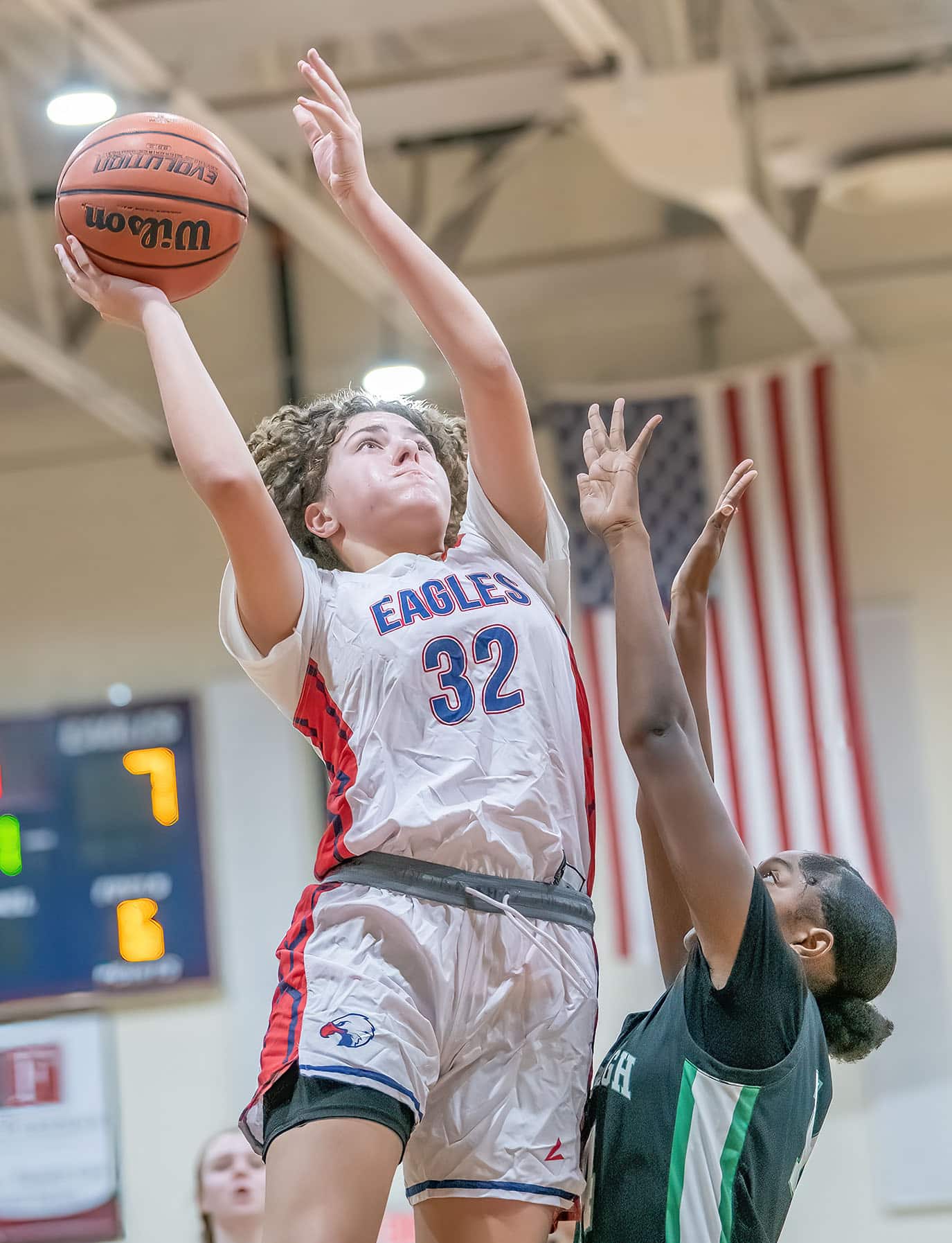 Springstead , 32, Addy Osborne shoots over Gulf High’s ,14, Ania Butler Wednesday in the Springstead Holiday Tournament. Photo by JOE DiCRISTOFALO