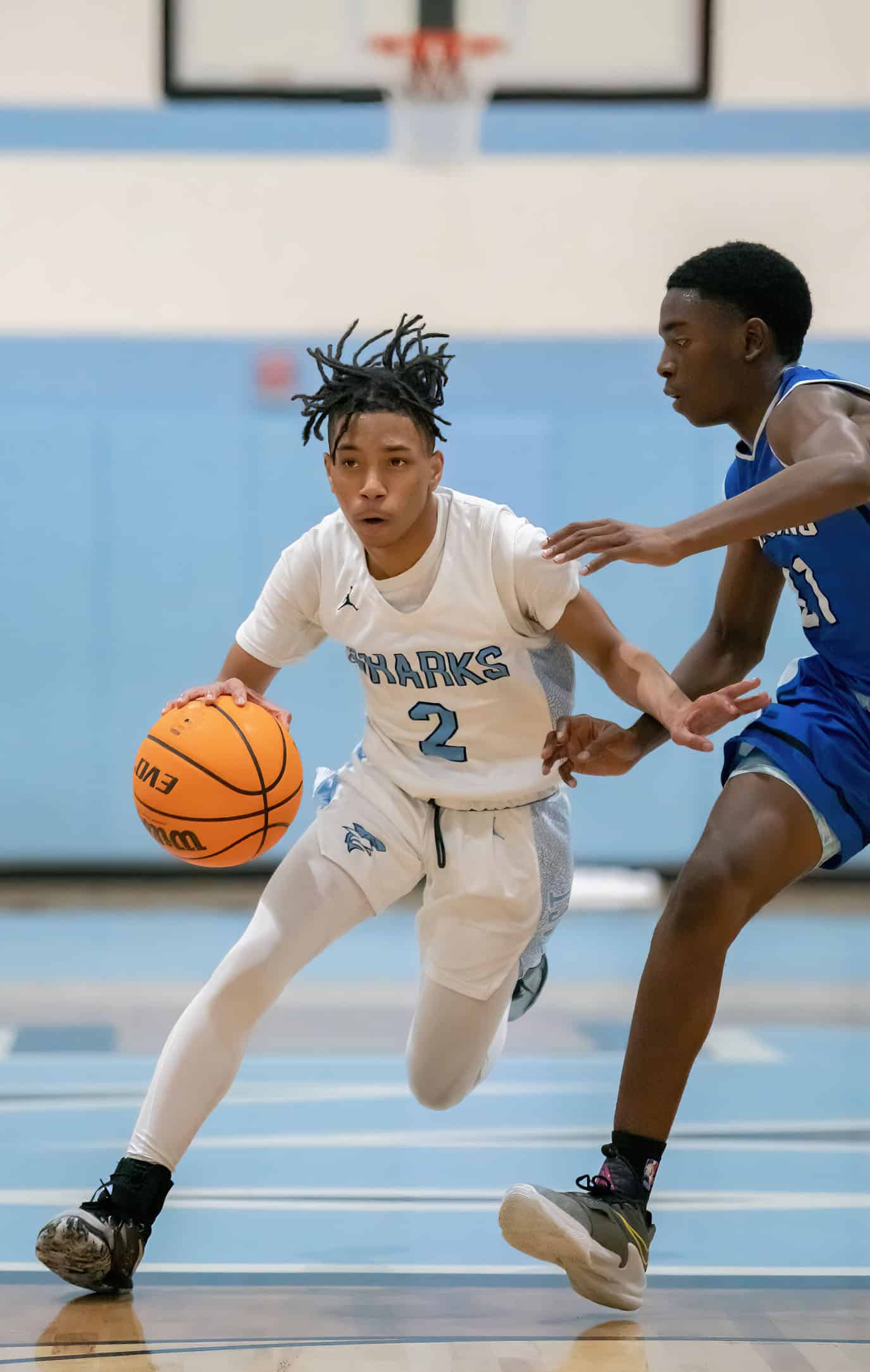 Nature Coast’s ,2,Sheldon Cotton hustles the ball up court against Sebring High Thursday in the Final Game of the Nature Coast Christmas Tournament. Photo by JOE DiCRISTOFALO
