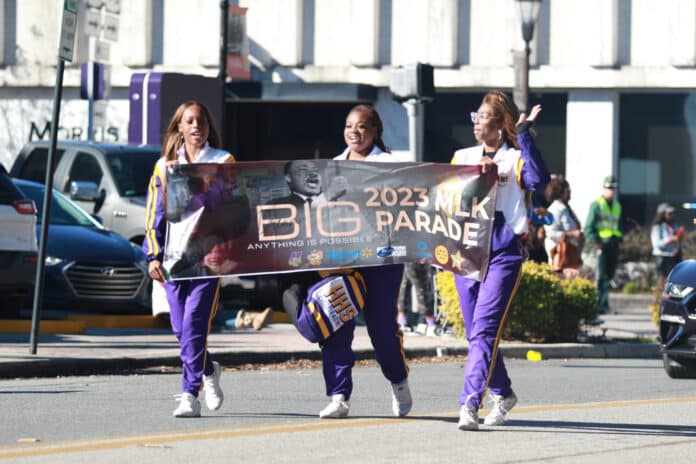 Hernando High School Cheerleaders start off the 2023 MLK Parade Monday 1/16/23 in downtown Brooksville. Photo by Cheryl Clanton