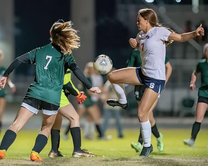 Springstead ,7, Ava Kanaar uses a knee to redirect the ball for a goal 1/10/23 Tuesday night at Weeki Wachee High School. Photo by JOE DiCRISTOFALO