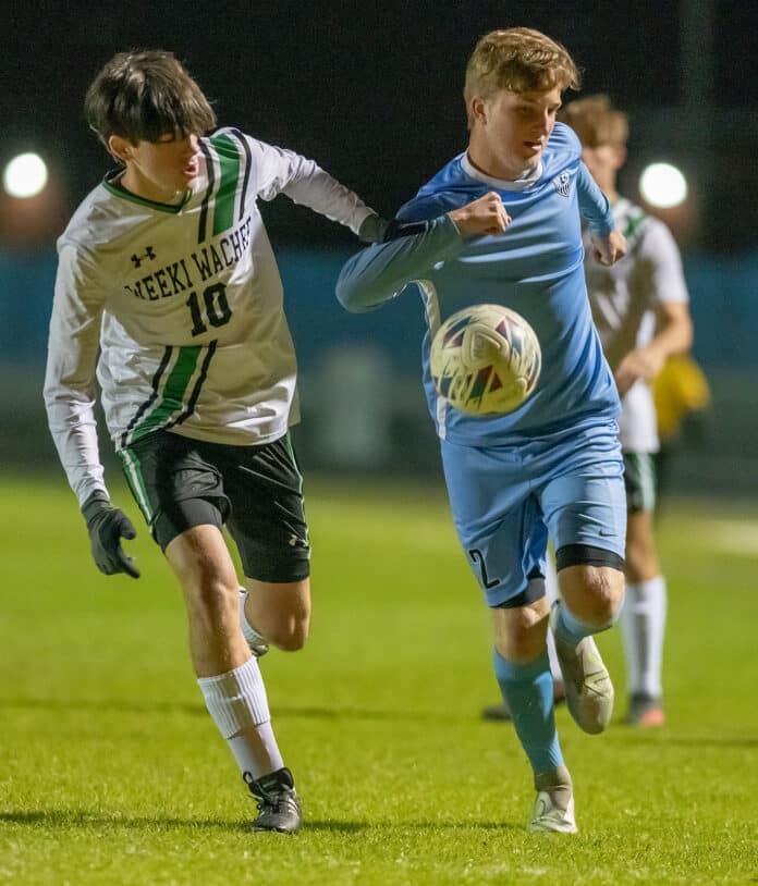 Weeki Wachee, 10 Daniel Greenwalt, defends Nature Coast 12 ﻿Friday night in Brooksville. Photo by Joseph DiCristofalo.