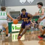 Hernando High ,23, Jesse Stewart tries to split the Weeki Wachee defense Tuesday night at Weeki Wachee High. Photo by JOE DiCRISTOFALO