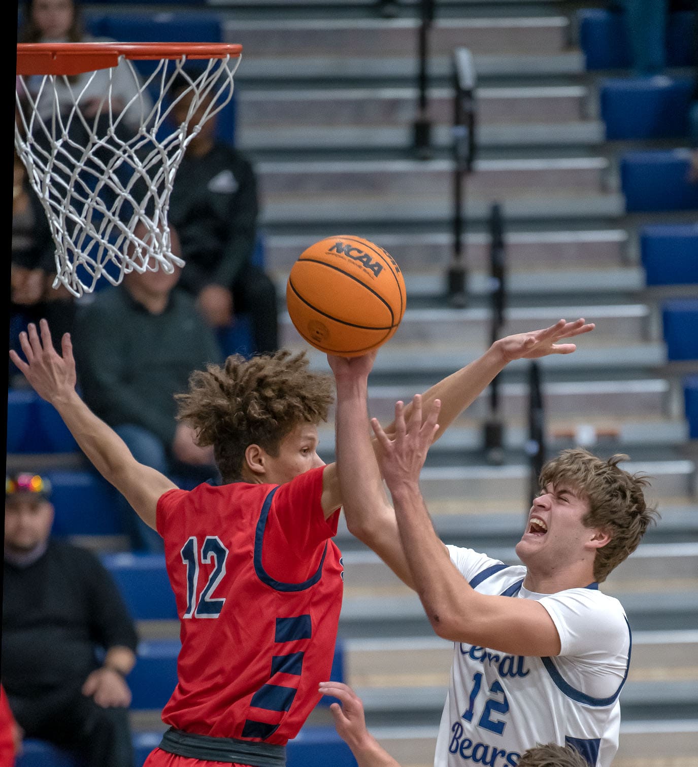 Central High, 12, Caden Bergantino tries to put up a shot against the defense by Springstead, 12, Austin Nicholson Friday night at Central High. Photo by JOE DiCRISTOFALO