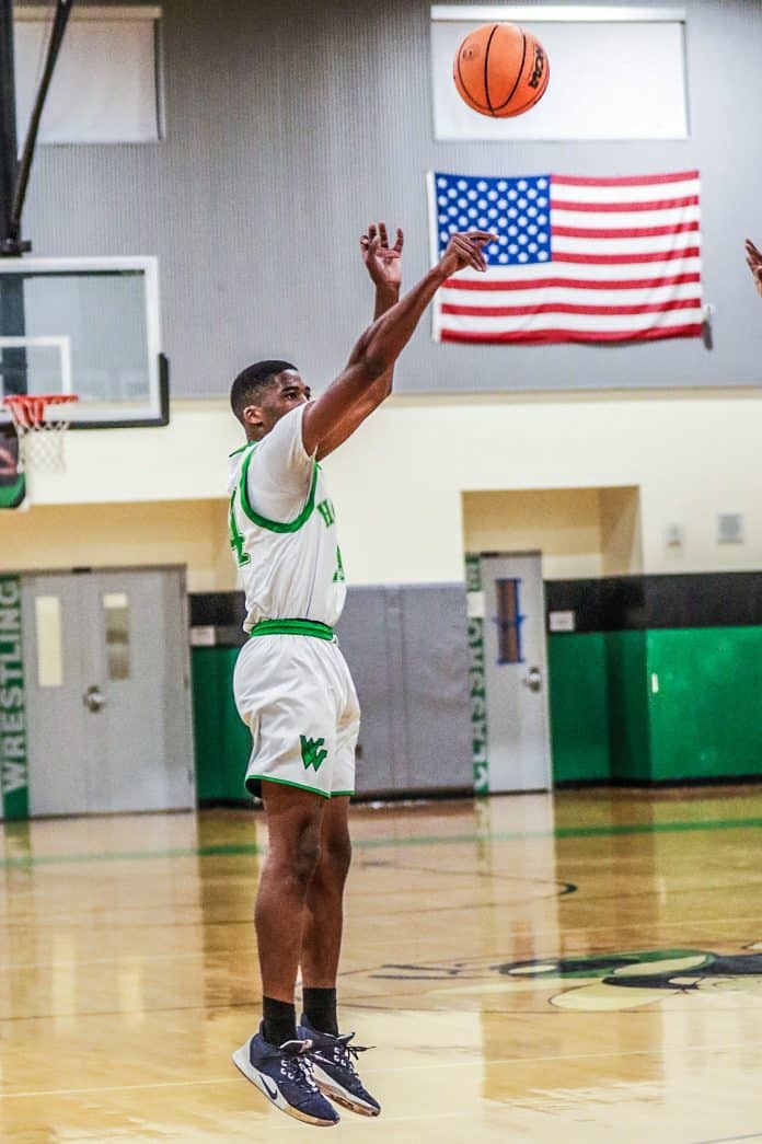 Thursday night Hornet #24 Anthony Wilson takes it to the rim in game against Gulf High School. Photo by Cheryl Clanton.