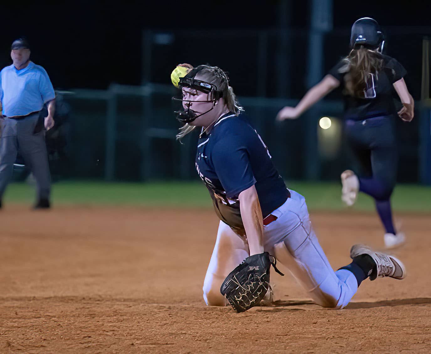 Springstead High second baseman, Liberty Savarese throws to first after a diving snare of a ground ball in the game against Hernando High Thursday night.Photo by JOE DiCRISTOFALO