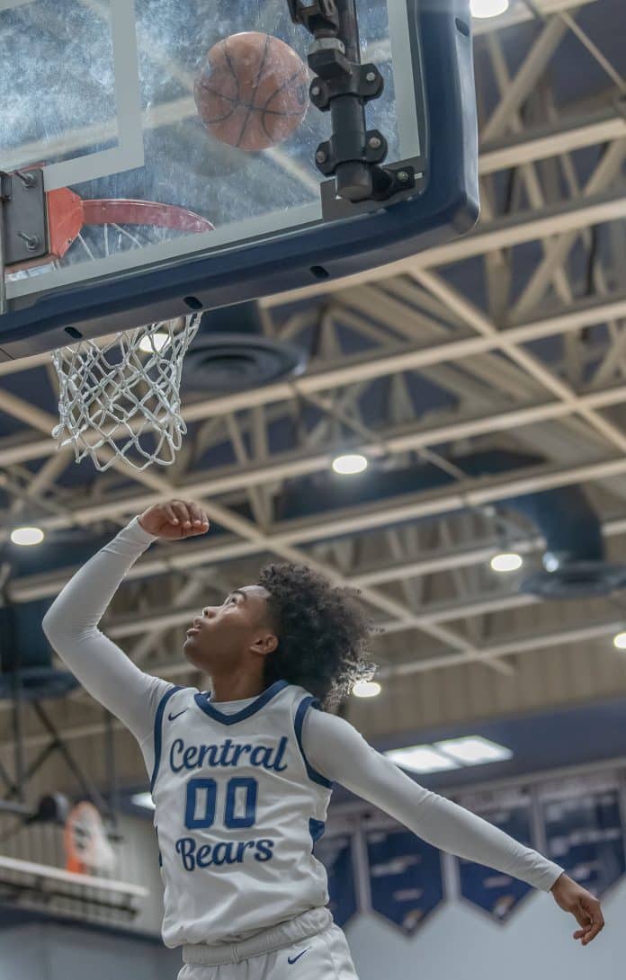 Central High, 00, Tylor Daniel scores with a lay up shot in the 68-33 Regional Quarterfinal win over visiting Robinson High. Photo by JOE DiCRISTOFALO