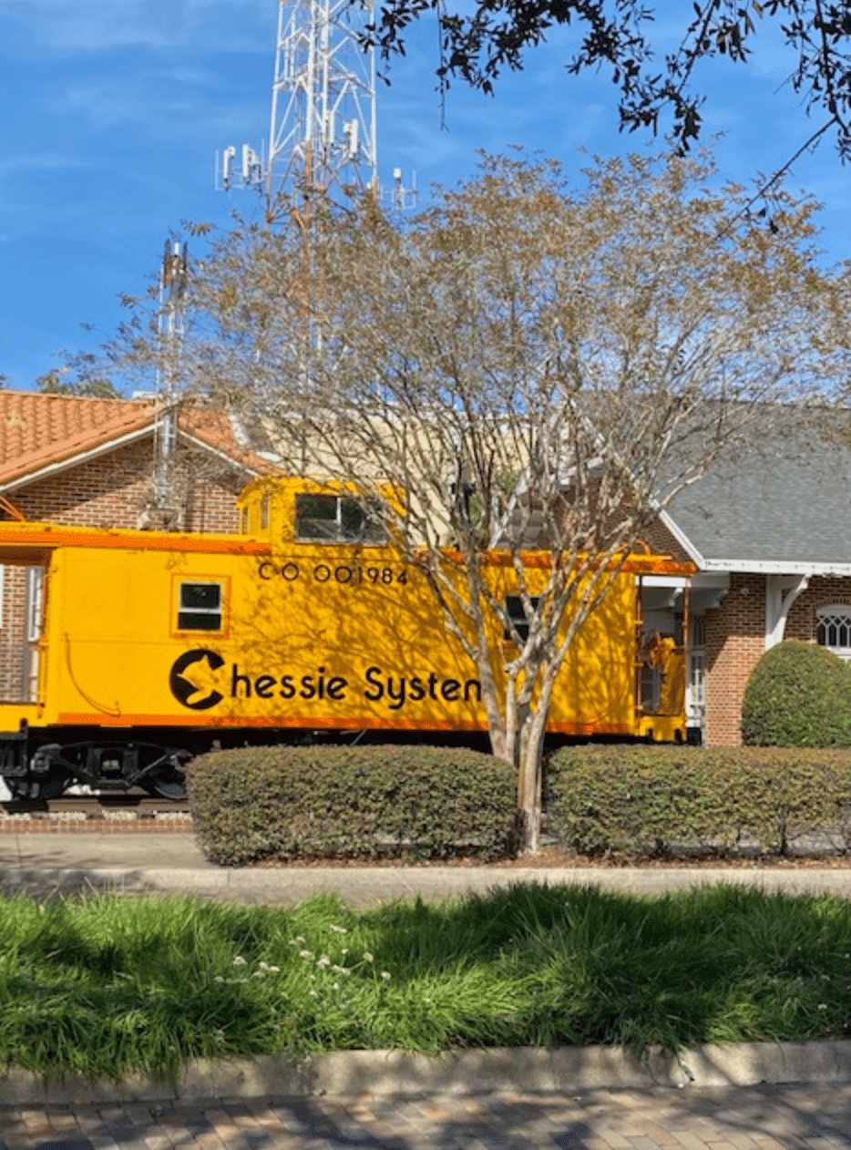 Bright yellow Chesapeake and Ohio Caboose (circa 1948) on display in downtown Winter Garden by the Heritage Museum. It was decommissioned in the early 1980s. You can tour the inside of this train car during museum visiting hours, weekdays 11 am - 3 pm, closed on Sunday and Monday.