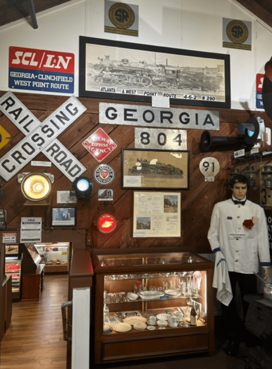 Display from the Central Florida Railroad Museum in Winter Garden. Note the cross buck Railroad Crossing sign, similar to the one I always saw in my childhood.