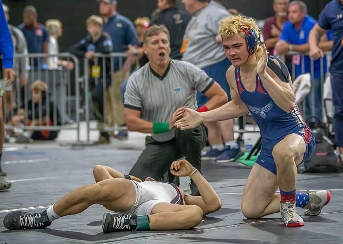 Springstead High’s 138-pound competitor, Josh Gallo celebrates after a last-second win over Austin Chang from Freedom High 6-4 at the FHSAA IBT Championships in Kissimmee. Photo by JOE DiCRISTOFALO