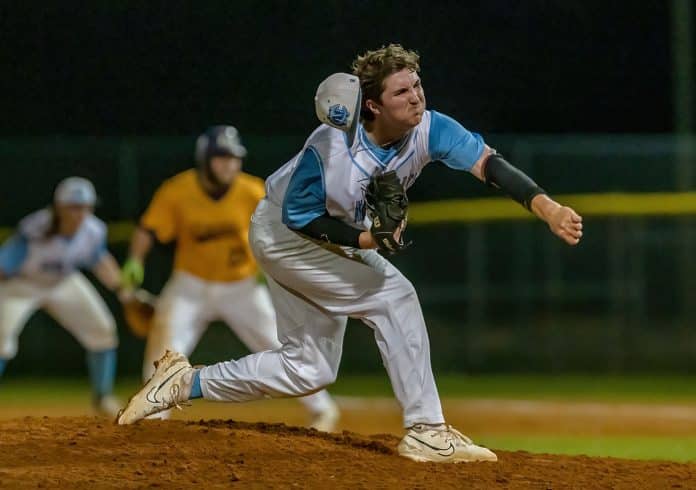 Nature Coast starting pitcher,5, Gavin McMurdopitches out of his hat in the game against visiting Hernando High Tuesday night. Photo by JOE DiCRISTOFALO