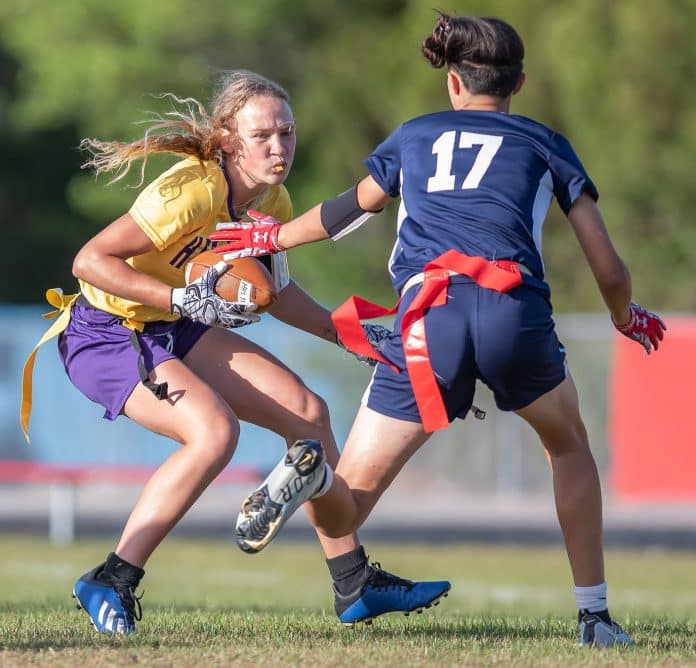 Hernando High, 5, Kasee Grant tries to elude Springstead High’s ,17, Kandace Hanshaw Monday at Booster Stadium. Photo by JOE DiCRISTOFALO