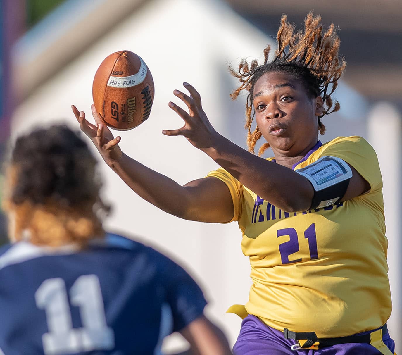 Hernando High, 21, Aaliyah Adams concentrates on catching a pass against Springstead Monday in Spring Hill. Photo by JOE DiCRISTOFALO