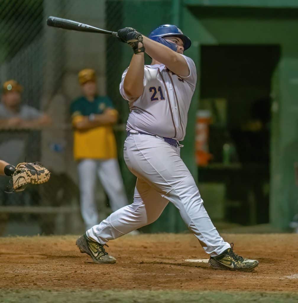 Hernando High, 21, Carlos Gonzalez follows his line drive to the base of the right field wall which turned into a long single and loaded the base against visiting Lecanto High. Photo by JOE DiCRISTOFALO