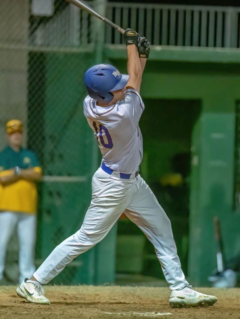 Hernando High’s Michael Savarese blasts the ball over the centerfielders head for a two run double against visiting Lecanto High. Photo by JOE DiCRISTOFALO