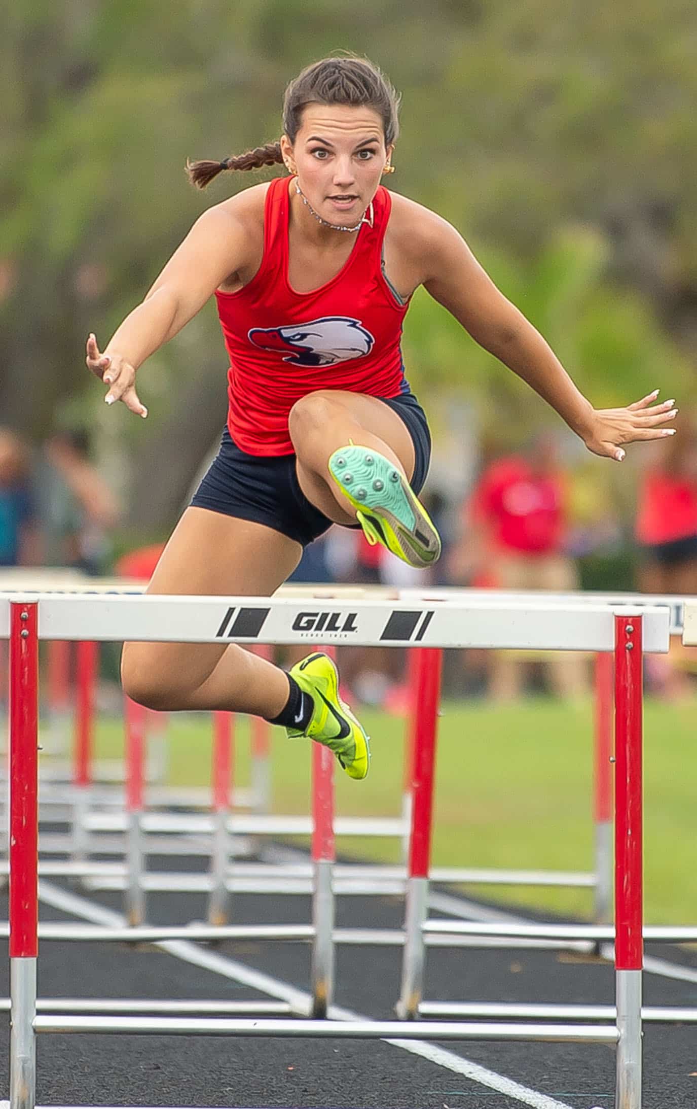 Springstead Hurdler, Victoria Enriquez finished third in the 100 meter event Wednesday at the Springstead Eagle Twilight Track Meet . Photo by JOE DiCRISTOFALO