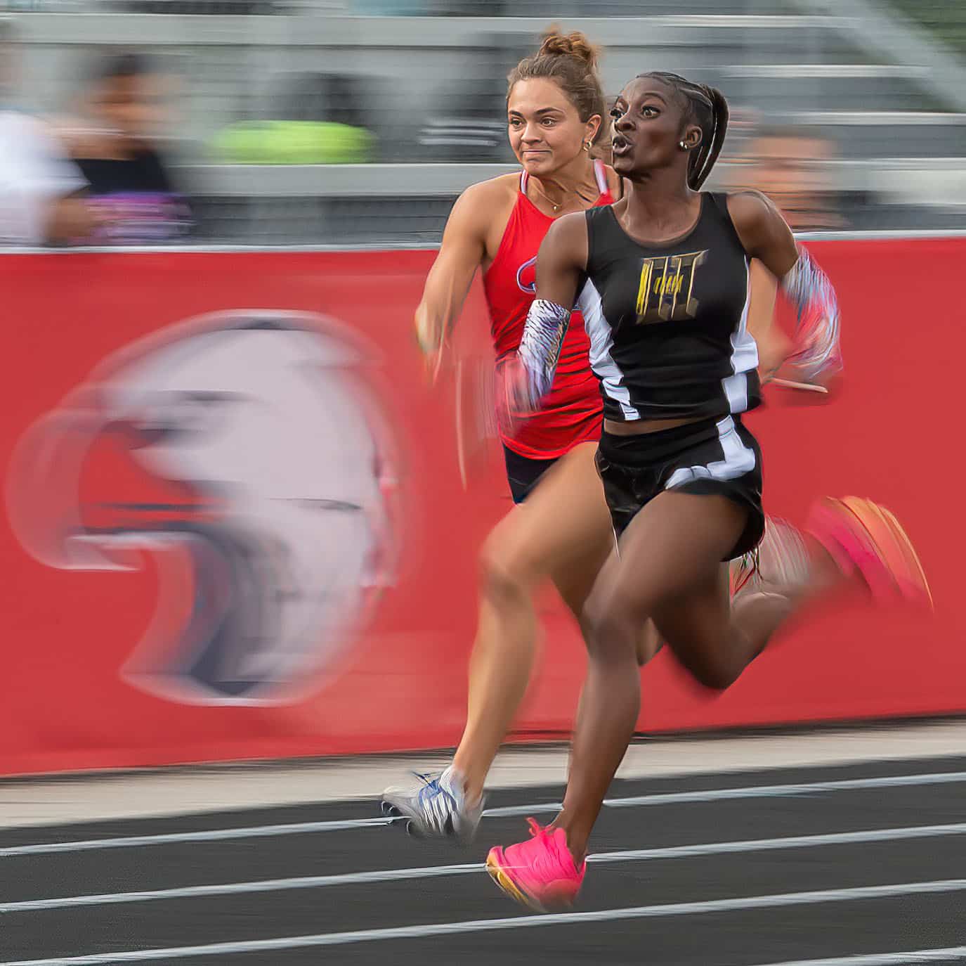 Hernando High’s Lentajhae Smith out battled Springstead High’s Ava Kanaar in the women’s 100 meter dash , finishing second and third. Wednesday at the Springstead Eagle Twilight Track Meet .Photo by JOE DiCRISTOFALO