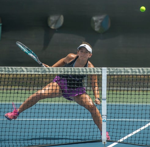 Hernando High's Annabelle Chamberlain follows a volley in her the number 2 doubles final match with Lecanto High during Gulf Coast 8 conference championship held a Delta Woods Park. Photo by JOE DiCRISTOFALO