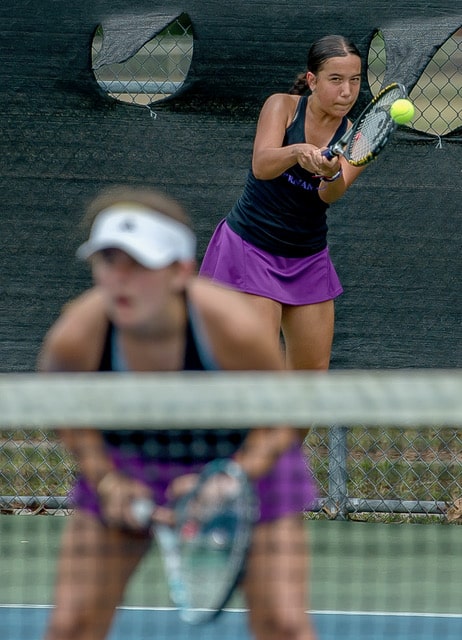 Hernando High's Valentina Vega-Diaz targets a return playing in the number 2 doubles final match with Annabelle Chamberlain against Lecanto High during Gulf Coast 8 conference championship held a Delta Woods Park. Photo by JOE DiCRISTOFALO