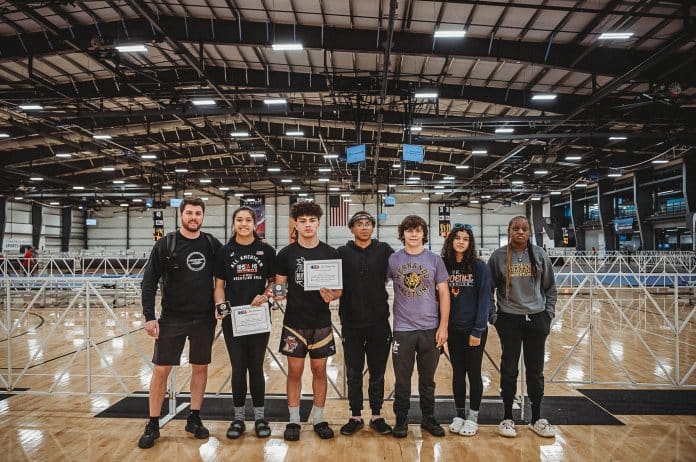 Hernando Wrestling Club attends at the 34th Annual High School National Tournament in Virginia Beach, VA. Left to right: Coach David Pritz, Grace Leota, Jeremiah Chavis, James Gadson, Shaw Garrett, Emma Bauknight, and Olivia Brown.