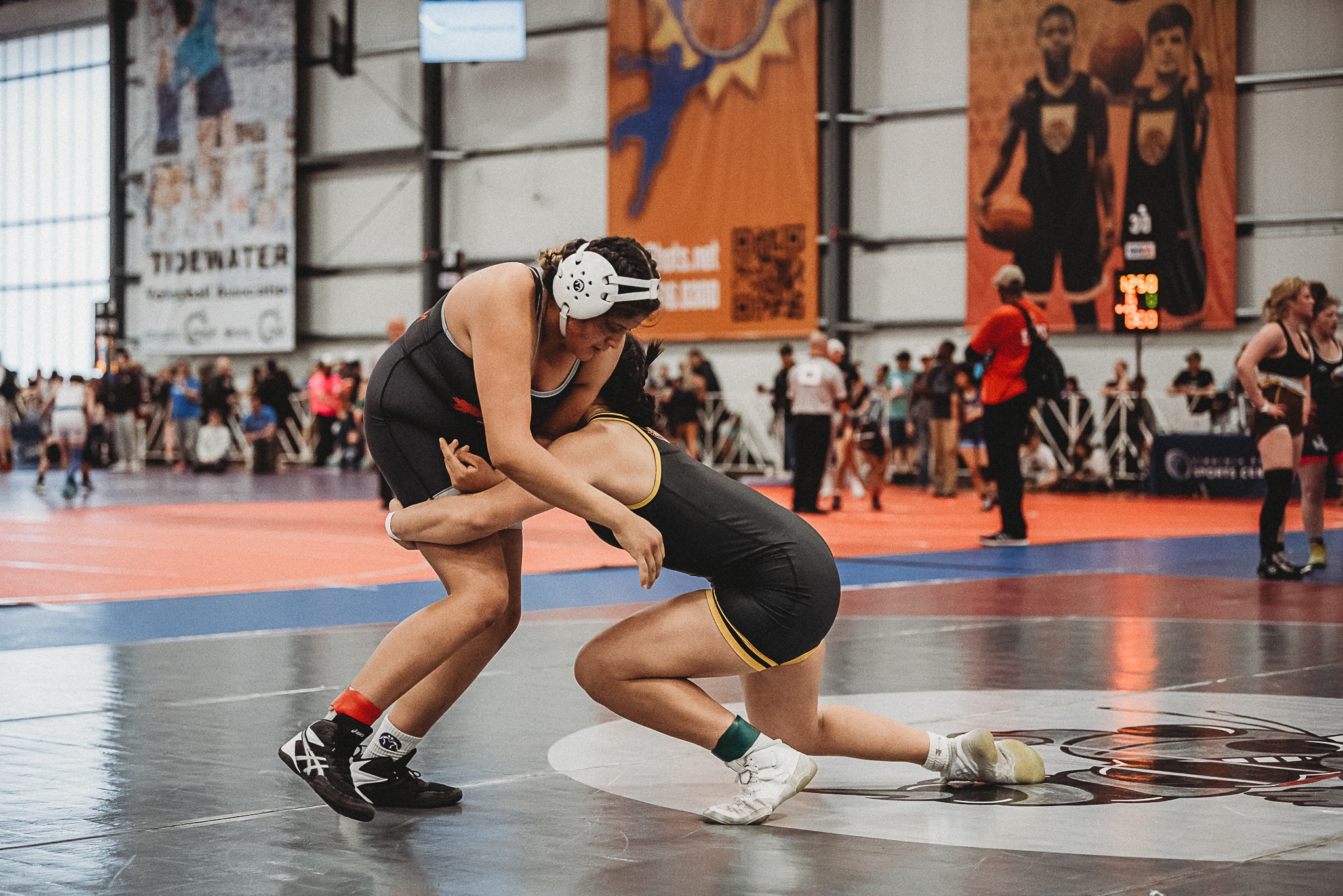 Grace Leota gets a double leg takedown against her opponent at the 2023 High School National Championship in Virginia Beach, VA.