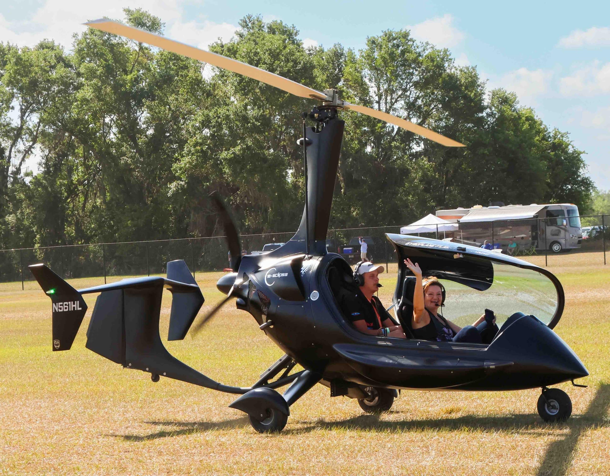 A lucky visitor takes an orientation flight in a Gyrocopter. Photo credit: Mark Stone