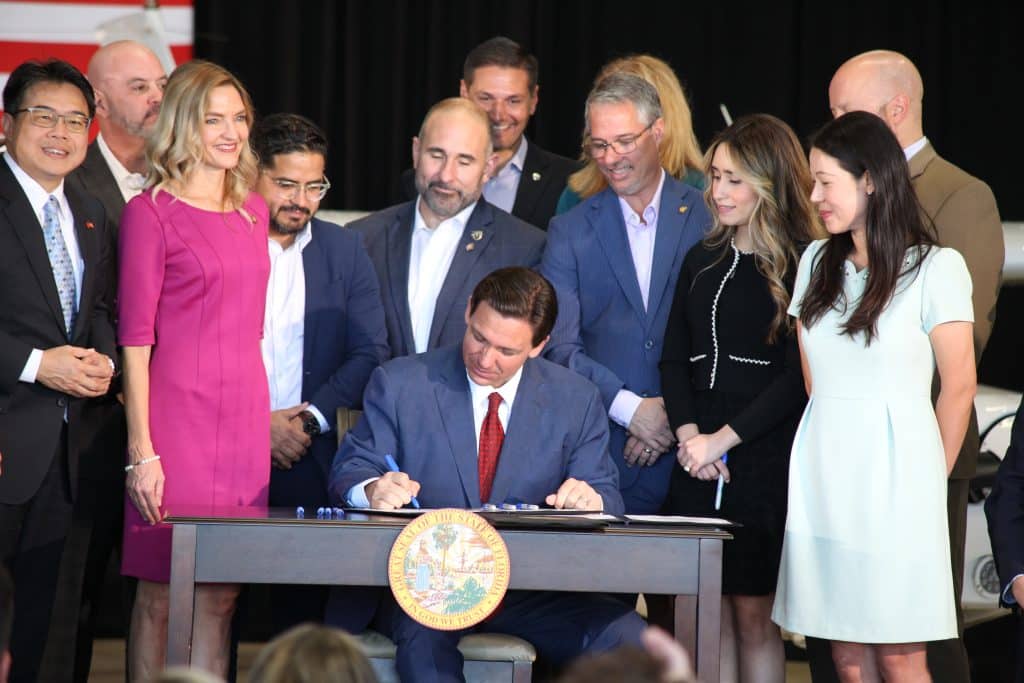 Gov. DeSantis signs Senate Bills 264, 846 and 258 at American Aviation in Brooksville, Fla. May 8, 2023. Photo by Hanna Fox.