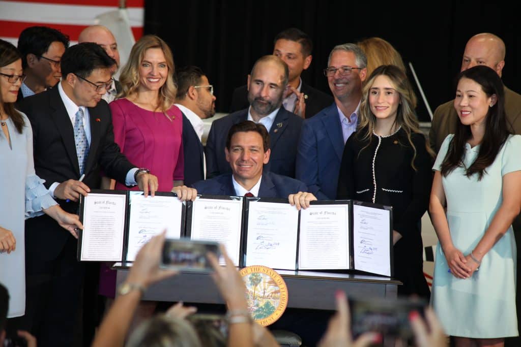 Gov. DeSantis with newly signed Senate Bills 264, 846 and 258 at American Aviation in Brooksville, Fla. May 8, 2023. Photo by Hanna Fox.