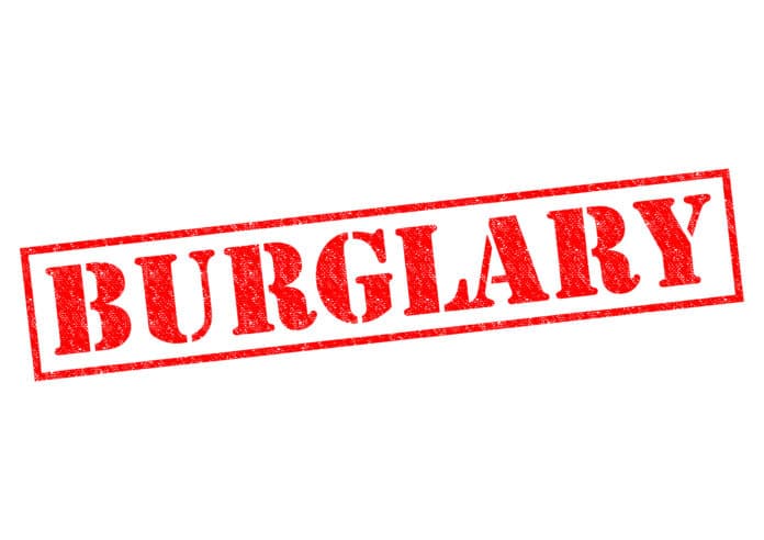BURGLARY red Rubber Stamp over a white background.