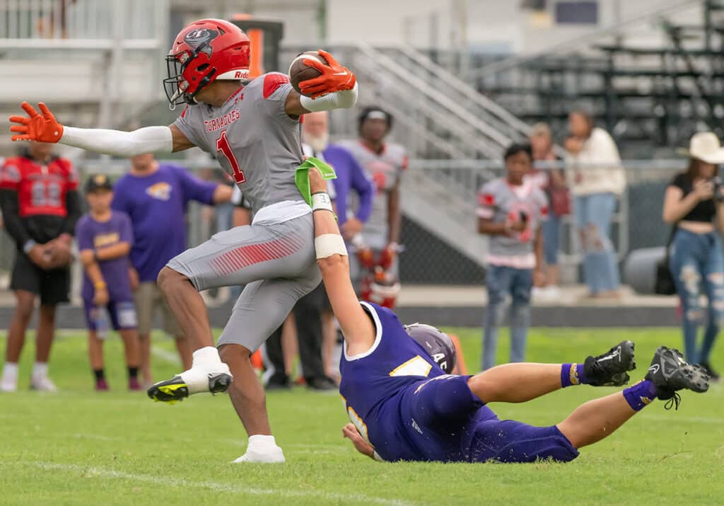 Hernando High, 45, Colton Ashworth works to pull down Clearwater ,1, Gage Nix early in Friday night preseason action in Brooksville. Photo by JOE DiCRISTOFALO