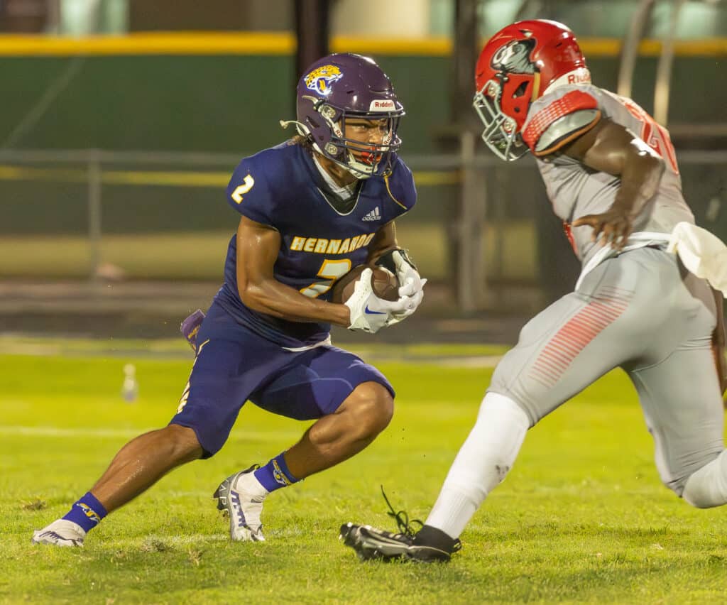 Hernando High,2, Gabe Sansone works a cut back move on a Clearwater defender Friday night in Brooksville. Photo by JOE DiCRISTOFALO