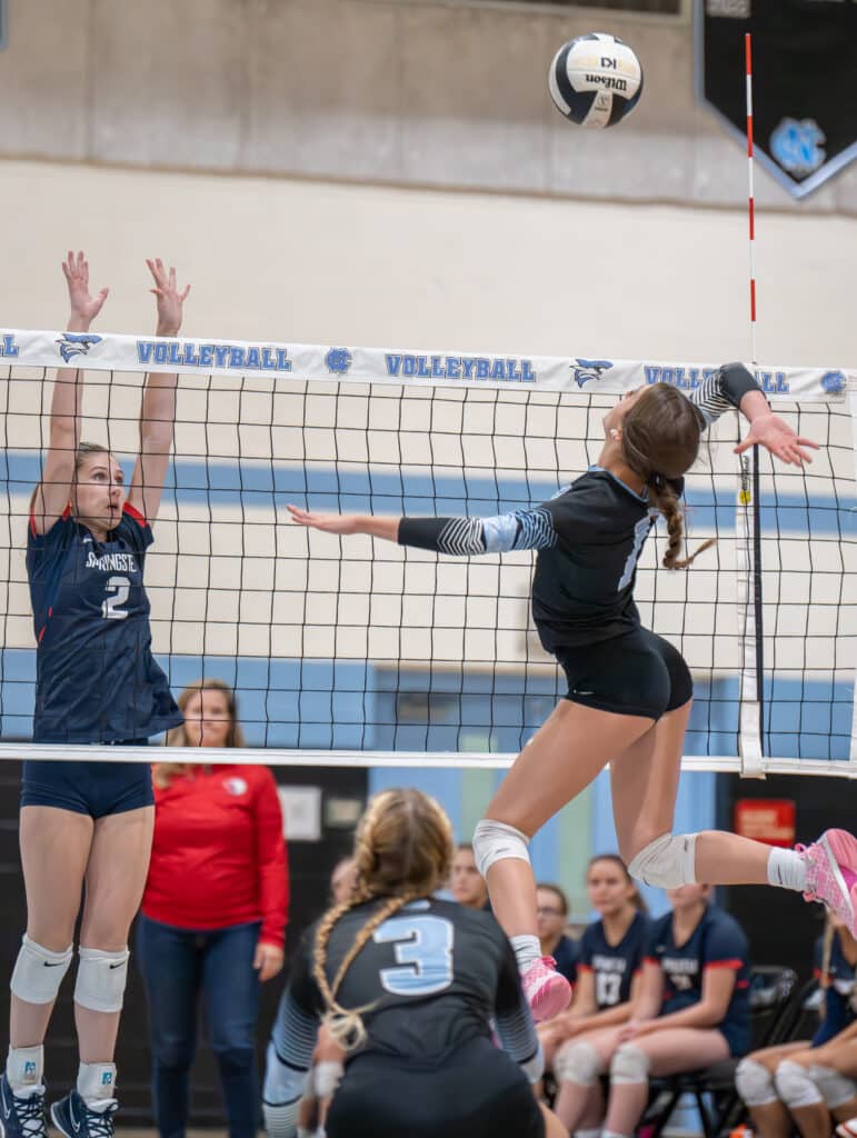 Nature Coast ,1, Jalena Hathorn elevates for a spike attempt as Springstead High's ,2, Savannah Imhof tries to block the attempt. Photo by Joe DiCristofalo.
