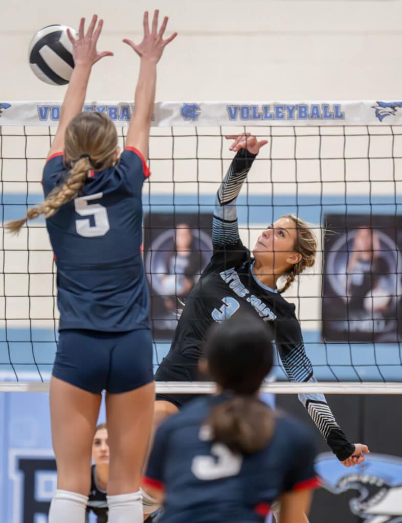 Nature Coast ,3, Ava Pontrelli, tries to hit past the defense by Springstead High's ,5, Rylynn Lanziero. Photo by Joe DiCristofalo