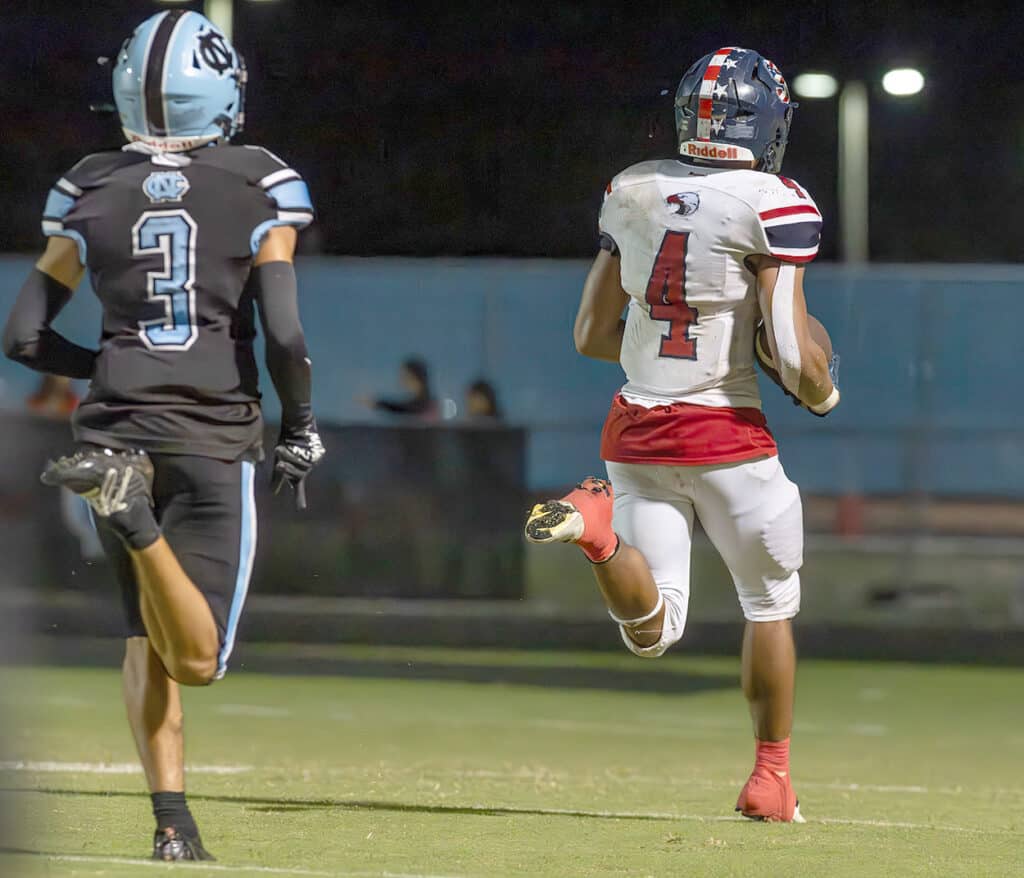 Nature Coast, 3, Carlos Rodriquez gave chase but couldn’t catch Springstead’s ,4, Connor McCazzio as he scores a 50 yard TD.Photo by Joe DiCristofalo