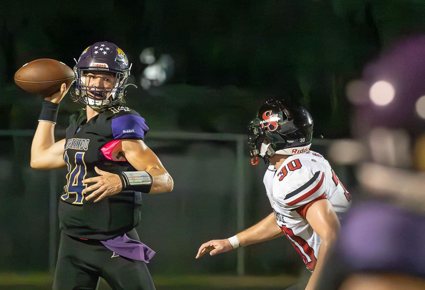 Hernando High QB, Michael Saltsman looks for an open receiver in the game with South Sumter Friday 10/13 in Brooksville. Photo by Joe DiCristofalo