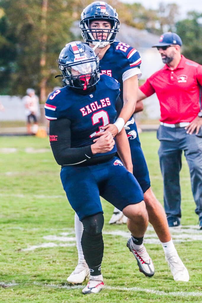 Friday Sept 29, 2023 at the Stead, the Bulls came stomping. Springstead #3 Pj Class and #22 Jaxson Nichols warmup on drills before game. [Credit: Cheryl Clanton]