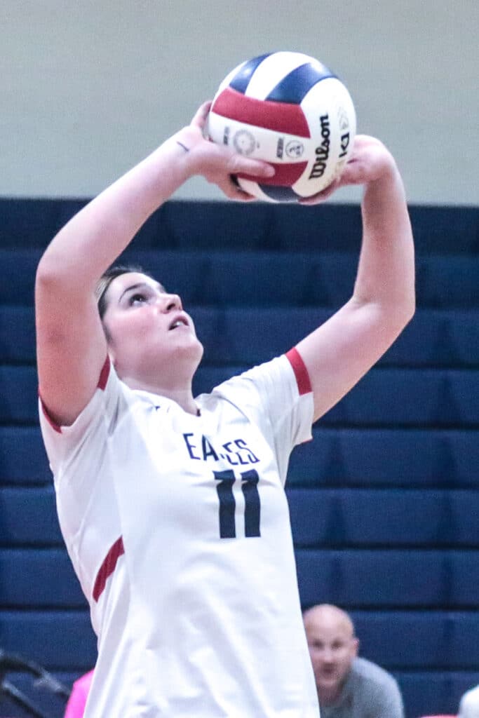 Eagles' #11 Fr. Mackenna Chambers setsup volley back to the Pinellas Park Patriots in the District Playoff Monday night Oct. 16, 2023. [Credit: Cheryl Clanton]
