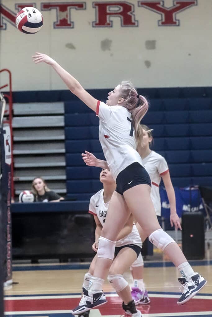 Eagles #7 So. Kat Schrade returns volley back to the Pinellas Park Patriots in the District Playoff Monday night Oct. 16, 2023. [Credit: Cheryl Clanton]