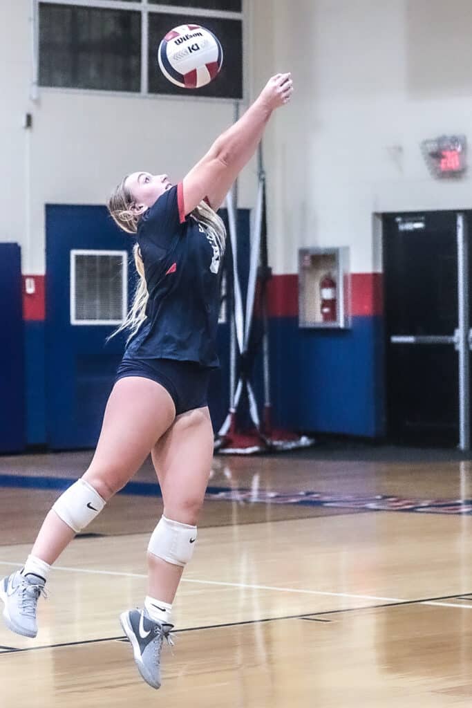 Eagles #8 So. Aubrie Gelm returns volley back to the Pinellas Park Patriots in the District Playoff Monday night Oct. 16, 2023. [Credit: Cheryl Clanton]