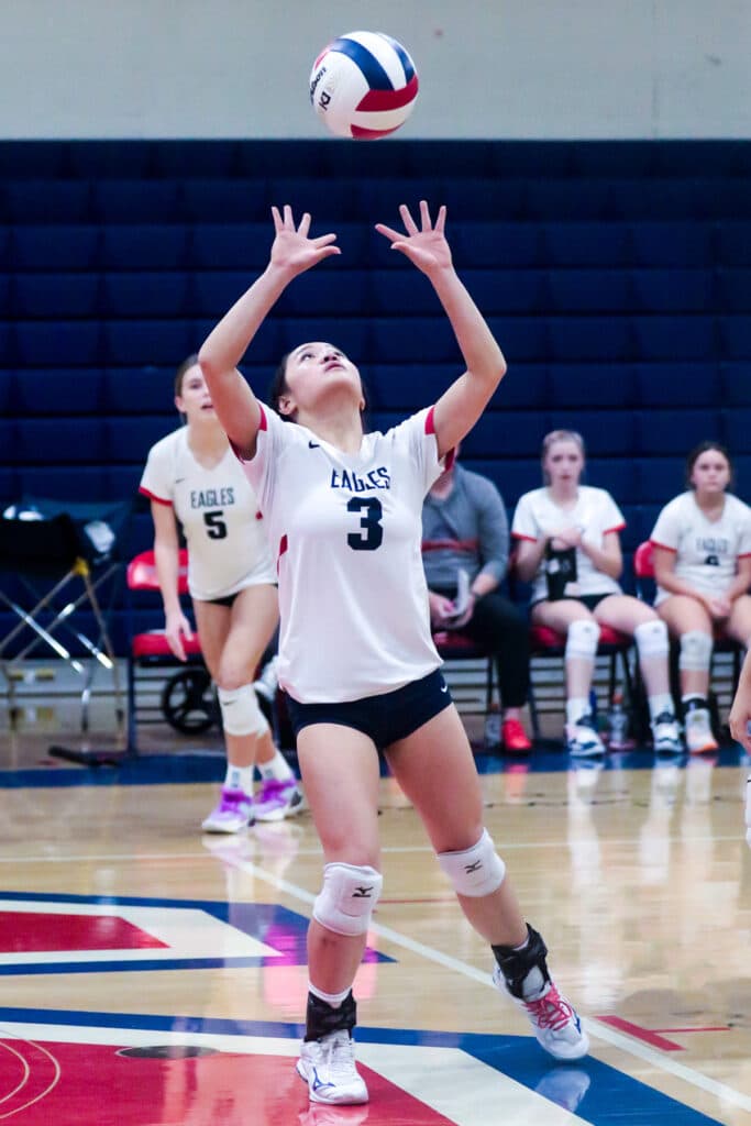 Girls Volleyball District Tournament Playoff Monday night Oct. 16, 2023 at Springstead. Eagles' #3 Sr. Isabella Nunag setsup the shot against the Pirates. [Credit: Cheryl Clanton]