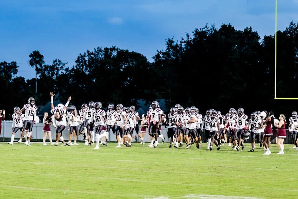 Friday Sept 29, 2023 at the Stead, Varsity Football Wiregrass Bulls make their grand entrance on the field. [Credit: Cheryl Clanton]